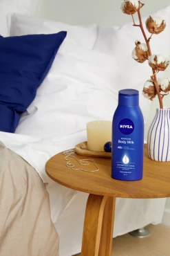 NIVEA Reichhaltige Body Milk 13 NIVEA Reichhaltige Body Milk -Mandarina Duck Fragrances-Shop MAM 7709817 SHOP IMAGE 1.4